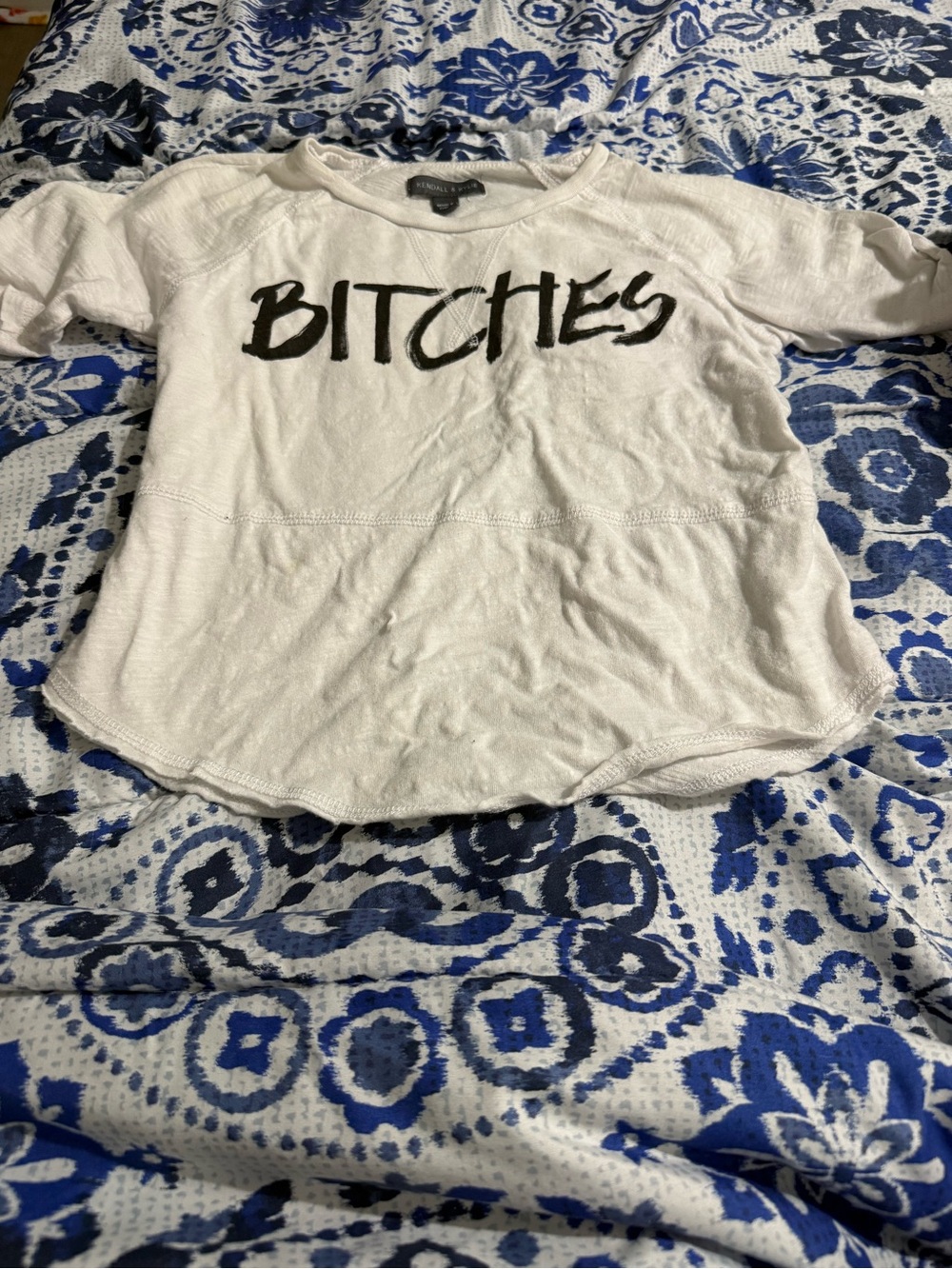 White Graphic Tee with Bold Black Text